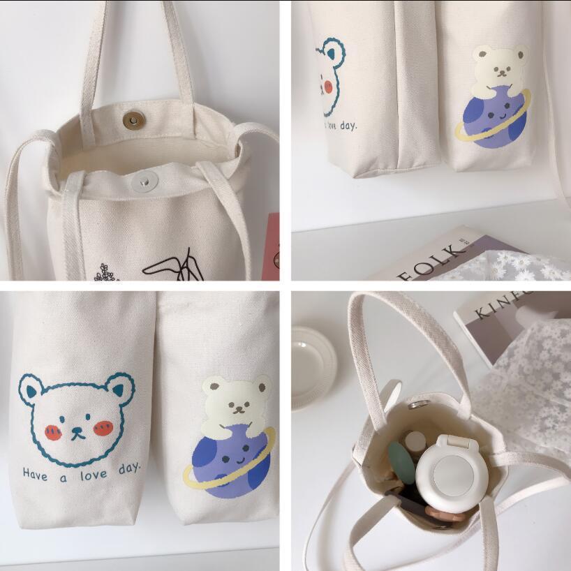 Túi vải Canvas đựng bình nước , đựng ô dù có quai đeo tiện dụng hình đẹp
