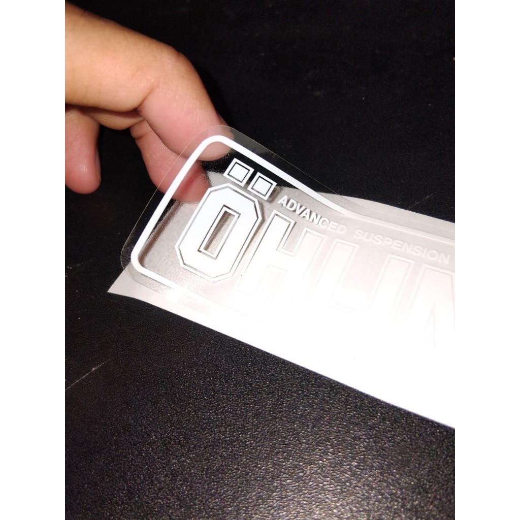 Logo mực trắng UV nền trong suốt. Tem in cao cấp, sắc nét, decal chống nước, không bay màu, ...