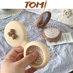 Lược Cầm Tay Gỡ Rối Kèm Gương Gấp Gọn Bỏ Túi TOMI 235