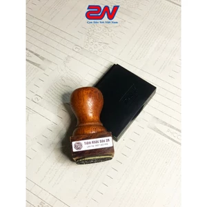 Dấu gỗ chấm mực dập lên bìa carton, giấy kart, dấu in logo mọi kích thước (nhận làm theo yêu cầu)