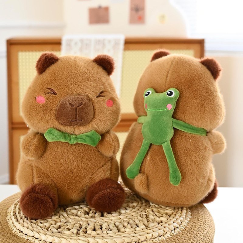 Gấu Bông Chuột lang nước Capybara đội mũ dâu, Capybara Đeo Balo Rùa ...