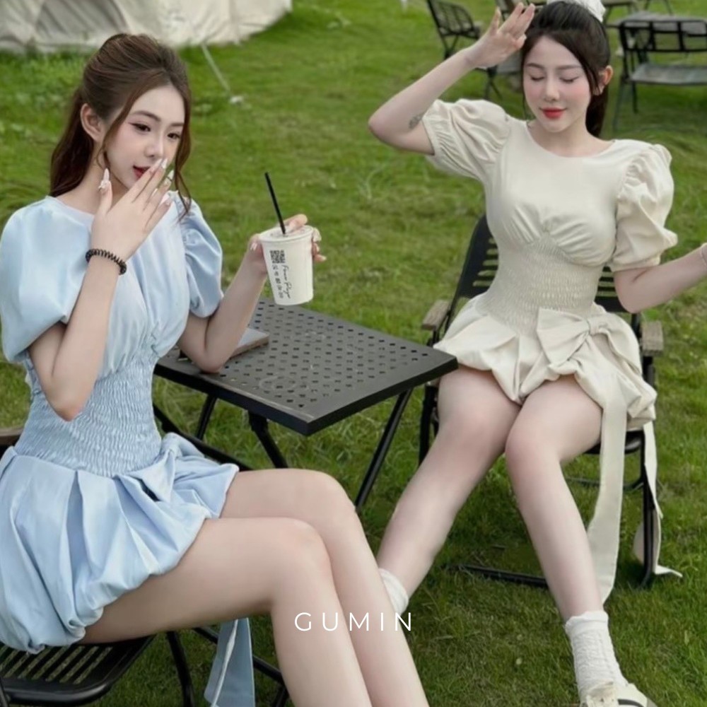Váy chun eo GUMIN thiết kế tay bồng và chun eo đính nơ, đầm có khóa kéo lưng kèm lót đùi bo chun trong sang trọng