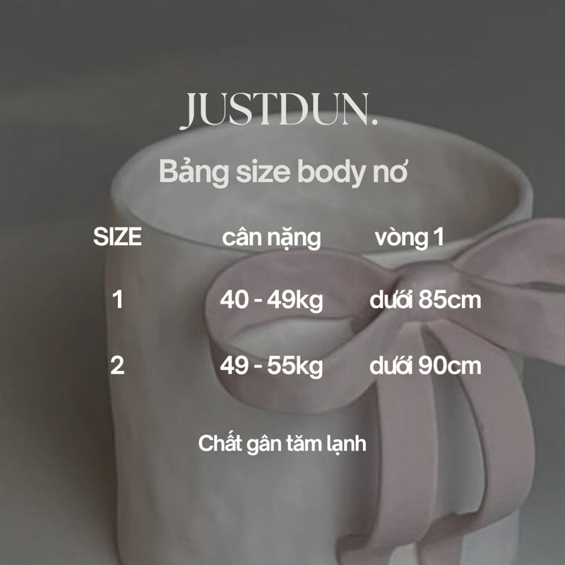 Áo thun ôm body đính nơ chất gân tăm