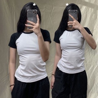 Áo đắp lăn tay ngắn tay phối màu đen