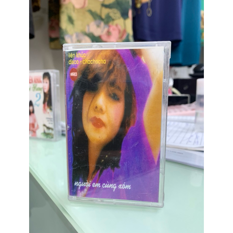Băng Cassette Liên Khúc Disco Chachacha Người Em Cùng Xóm - Nhã Thanh, Lê Tuấn