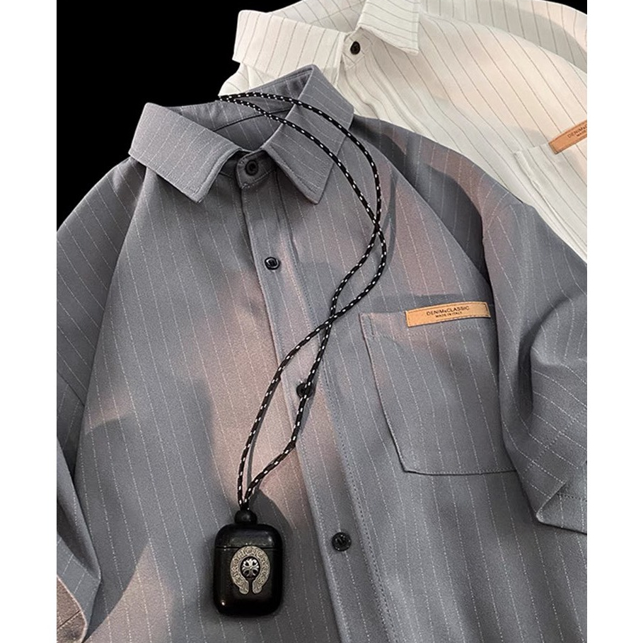 Áo sơ mi cộc tay nam nữ kẻ sọc nhẹ, 2 màu ghi trắng hottrend có logo ở túi trước, designed by Nice Clothes | BigBuy360 - bigbuy360.vn