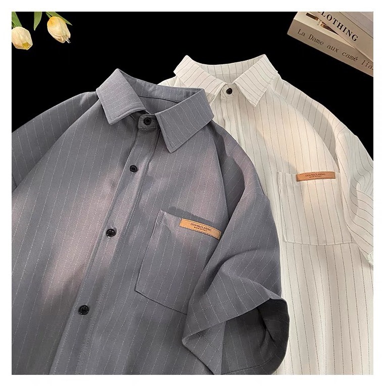 Áo sơ mi cộc tay nam nữ kẻ sọc nhẹ, 2 màu ghi trắng hottrend có logo ở túi trước, designed by Nice Clothes | BigBuy360 - bigbuy360.vn