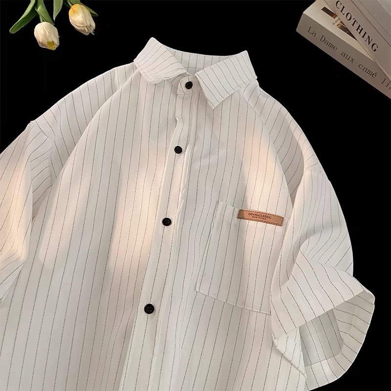 Áo sơ mi cộc tay nam nữ kẻ sọc nhẹ, 2 màu ghi trắng hottrend có logo ở túi trước, designed by Nice Clothes | BigBuy360 - bigbuy360.vn