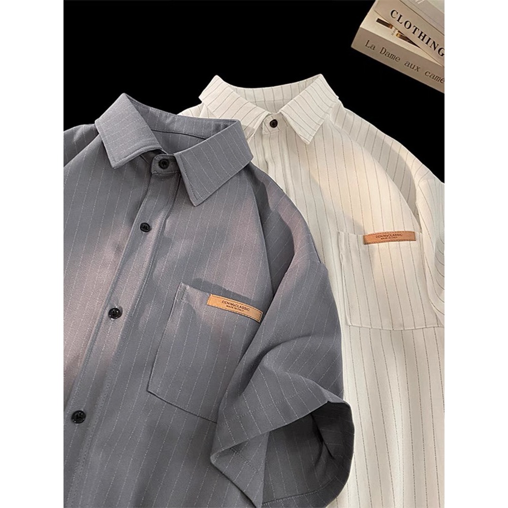 Áo sơ mi cộc tay nam nữ kẻ sọc nhẹ, 2 màu ghi trắng hottrend có logo ở túi trước, designed by Nice Clothes | BigBuy360 - bigbuy360.vn