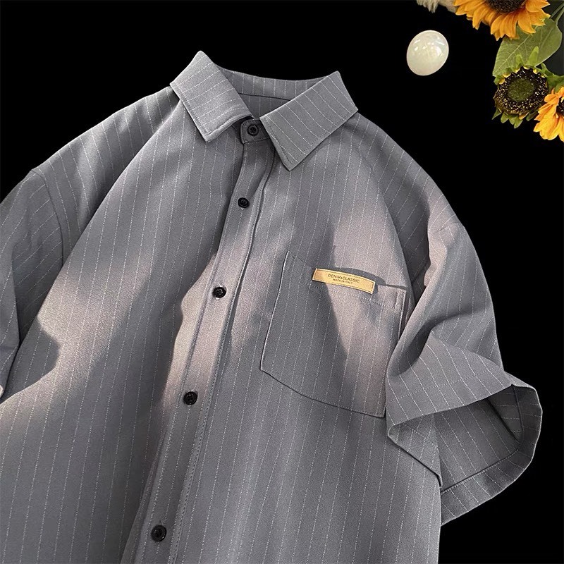 Áo sơ mi cộc tay nam nữ kẻ sọc nhẹ, 2 màu ghi trắng hottrend có logo ở túi trước, designed by Nice Clothes | BigBuy360 - bigbuy360.vn