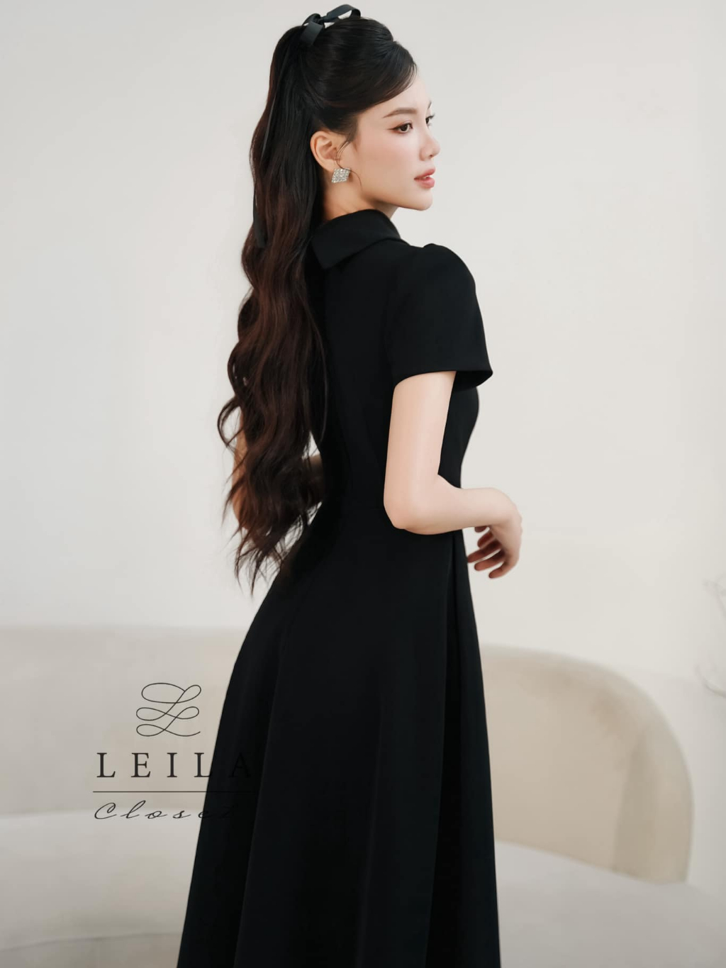 Ảnh LEILA CLOSET | Đầm thiết kế Sanee đen cổ Đức khoét ngực, tùng xoè dài có túi, dây belt tôn dáng 2