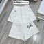 Quần short jean nữ lưng cao chất denim không co giãn thêu nơ túi trước sau Anngo - AT479
