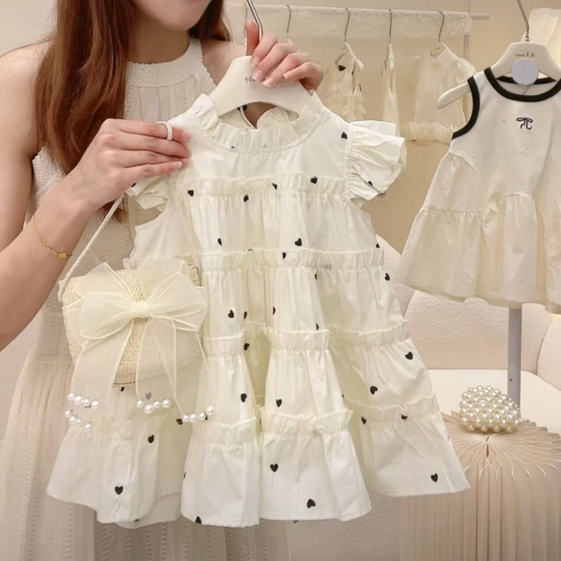 (Order) Váy trắng cho bé gái bồng xoè hoạ tiết chấm tim đen phong cách Hàn Quốc dễ thương