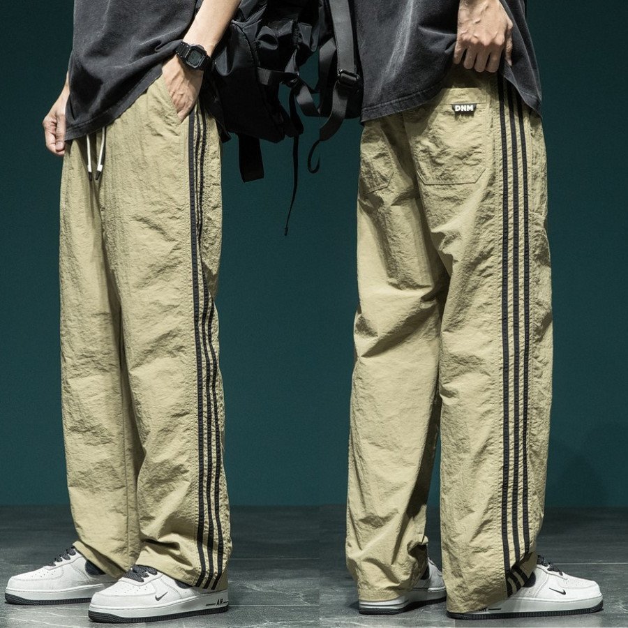 Quần gió nam Quảng Châu cao cấp, quần dài cản gió chống nước chống bụi, phối line Style thể thao, cỡ đại đến 95kg¬_1194