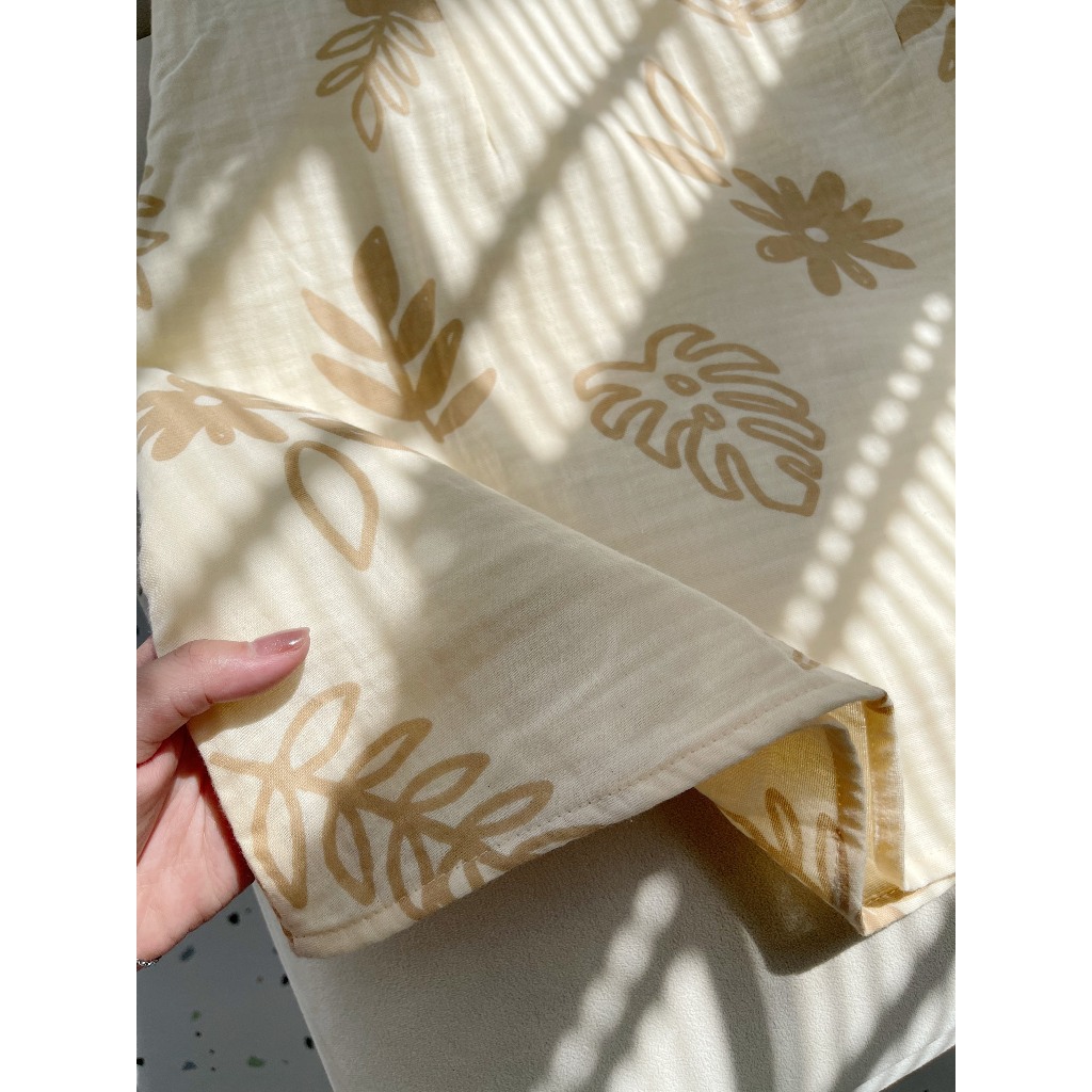 Đầm hoa cổ yếm với thiết kế hoa lá nhẹ nhàng kết hợp màu be cho chị em đón hè - Ou dress Gem Boutique