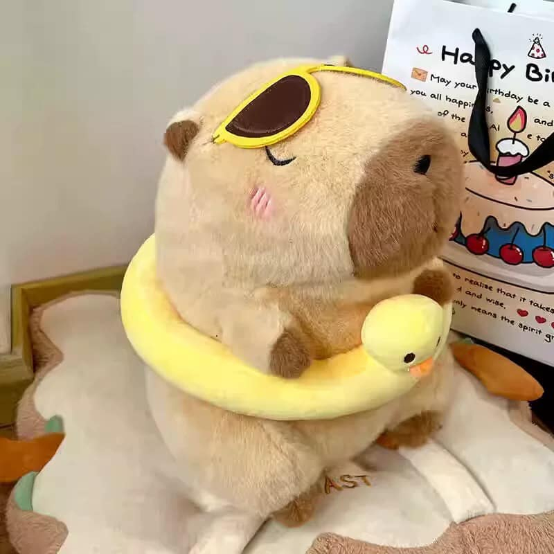 Gấu bông capybara đi biển đeo phao vịt dễ thương capybara má hồng lông thỏ cao cấp