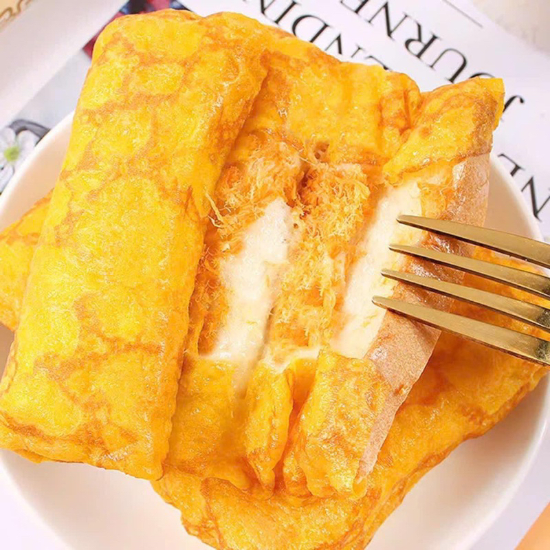 Hộp 2Kg Bánh da trứng cuộn kem tươi chà bông Ông đầu bếp (21-23 bánh )[ ngày in trên bao bì là ngày sx ]