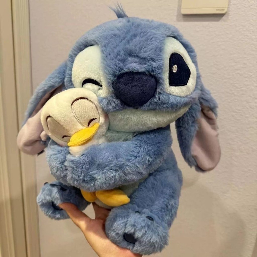 [ Hàng Sẵn ] Gấu bông stitch ôm vịt đáng yêu, Gấu nhồi bông Stitch lông thỏ cao cấp mẫu mới dễ thương
