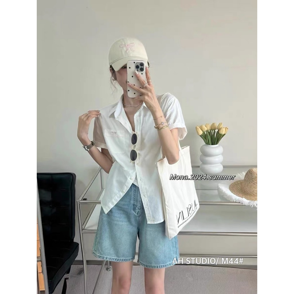 Áo Sơ Mi Nữ Cộc Tay Thêu Nơ Túi Chất Liệu Thô Mềm Mát - Sơ Mi Nữ Công Sở Dáng Rộng Thanh Lịch Trẻ Trung SM101