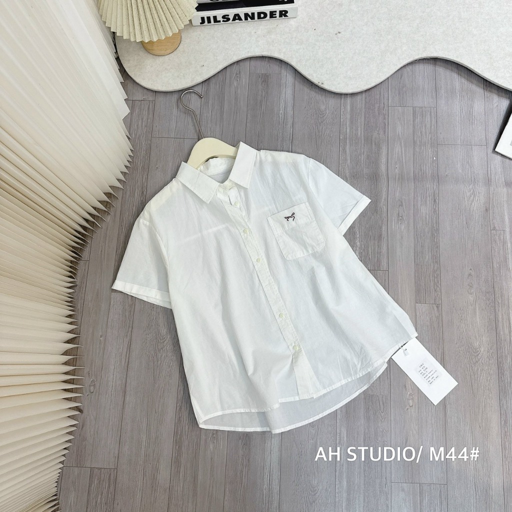 Áo Sơ Mi Nữ Cộc Tay Thêu Nơ Túi Chất Liệu Thô Mềm Mát - Sơ Mi Nữ Công Sở Dáng Rộng Thanh Lịch Trẻ Trung SM101