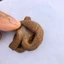 Mô hình cục shit troll bạn bè vui nhộn