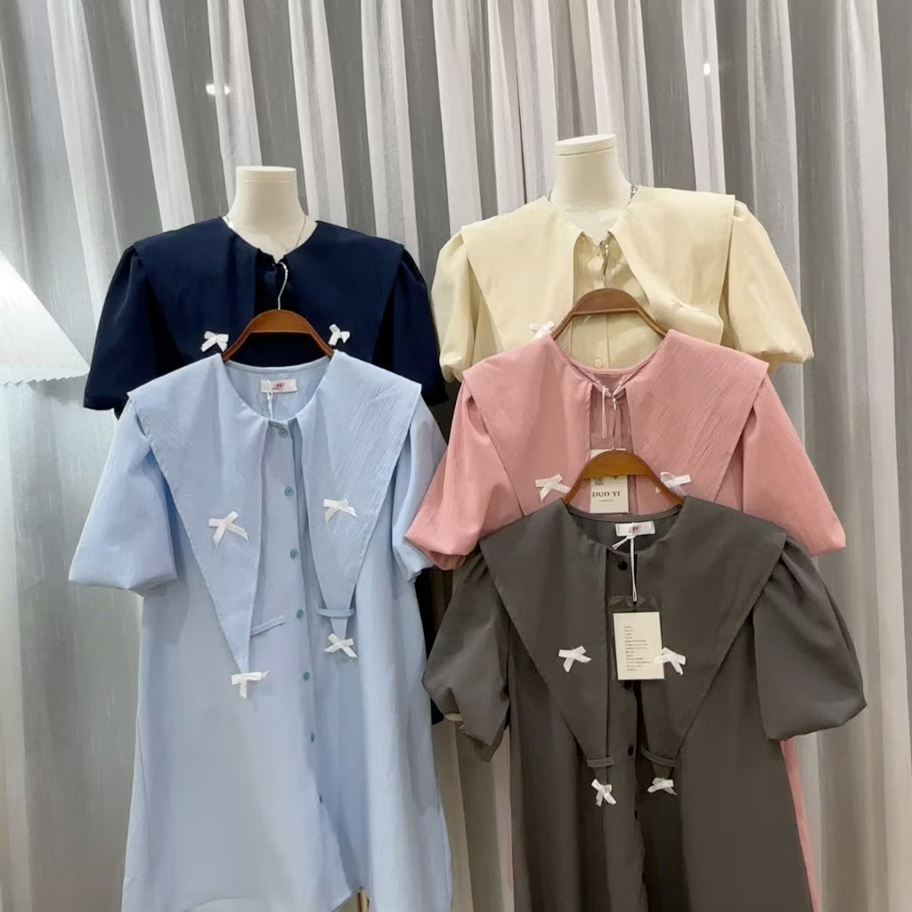 Váy babydoll cổ nhọn to tay bồng cộc dáng rộng gắn nơ cute Đầm sơ mi dễ thương