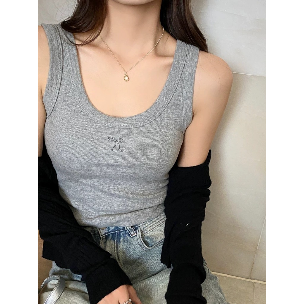 Áo ba lô cổ rộng dáng ôm In hình Nơ nhỏ JULY fashion2023, Áo ba lỗ chất gân tăm lụa mềm mại, co giãn 4 chiều.