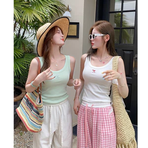 Áo ba lô cổ rộng dáng ôm In hình Nơ nhỏ JULY fashion2023, Áo ba lỗ chất gân tăm lụa mềm mại, co giãn 4 chiều.