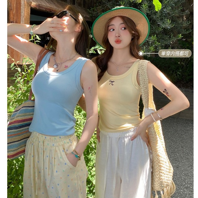 Áo ba lô cổ rộng dáng ôm In hình Nơ nhỏ JULY fashion2023, Áo ba lỗ chất gân tăm lụa mềm mại, co giãn 4 chiều.