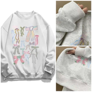 ￼Áo Nỉ Sweater Chất Nỉ Bông Hoạ Tiết In Hình Nơ Dễ Thương From Rộng Uniex