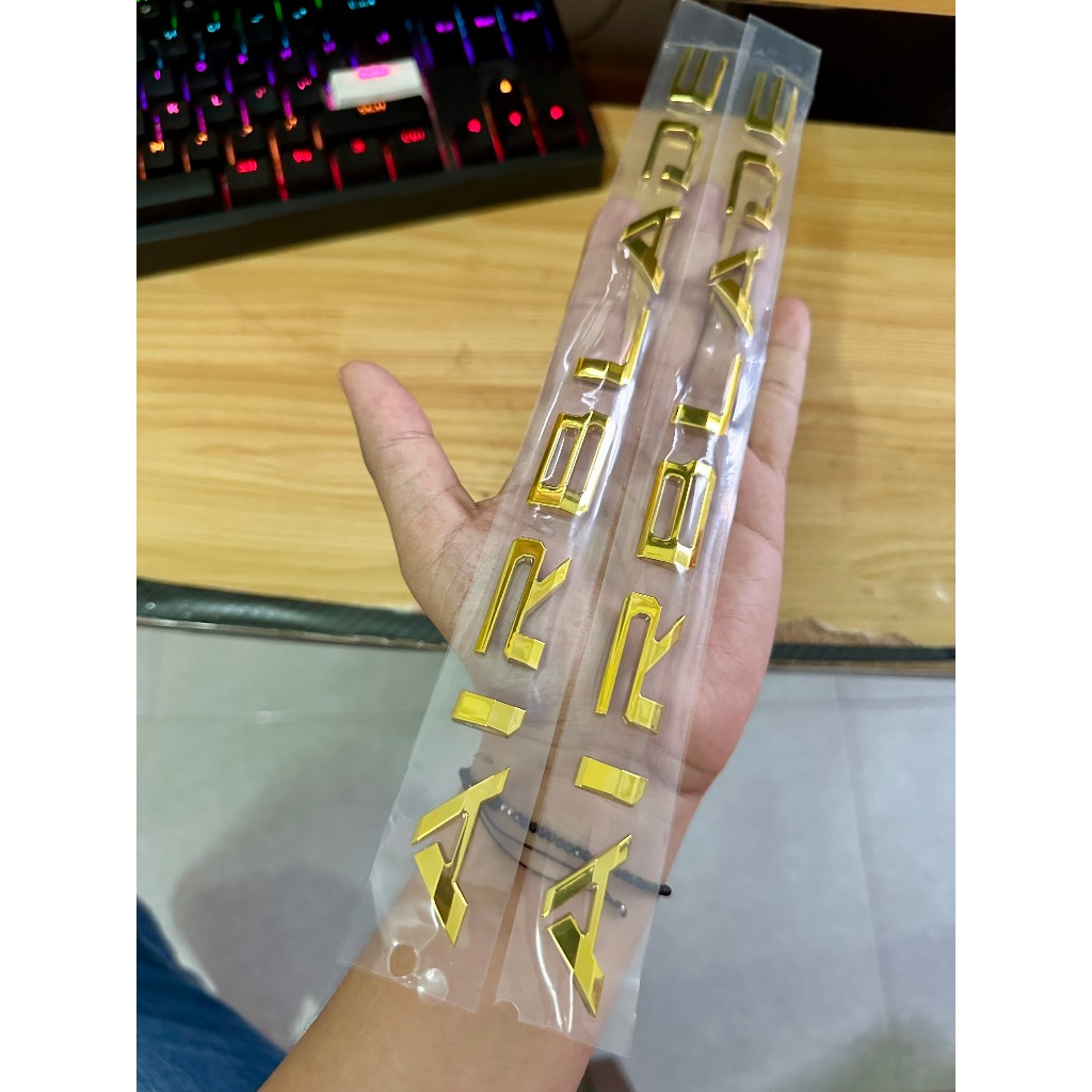 Tem AIRBLADE 2020 2024 chữ nổi màu VÀNG RỰC ốp sườn. Logo dán xe AB xi mạ cao cấp, có sẵn keo dán