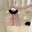 Váy khuy dáng rẻ chữ A cổ bèo hoạ tiết chấm bi nơ dành cho bé gái