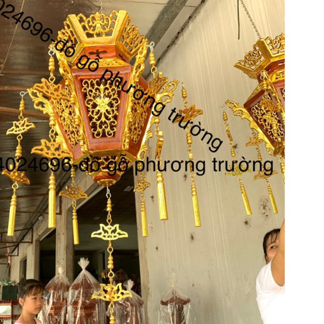 đèn trám treo gỗ hương Lào rát vàng dài 95 ngang 50( giá  1 cái )