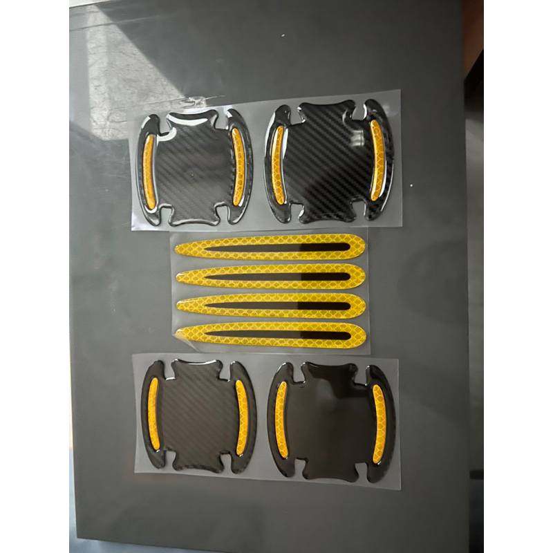 Sét 8 miếng dán tay nắm cửa xe hơi phản quang 3D kết cấu sợi cacbon