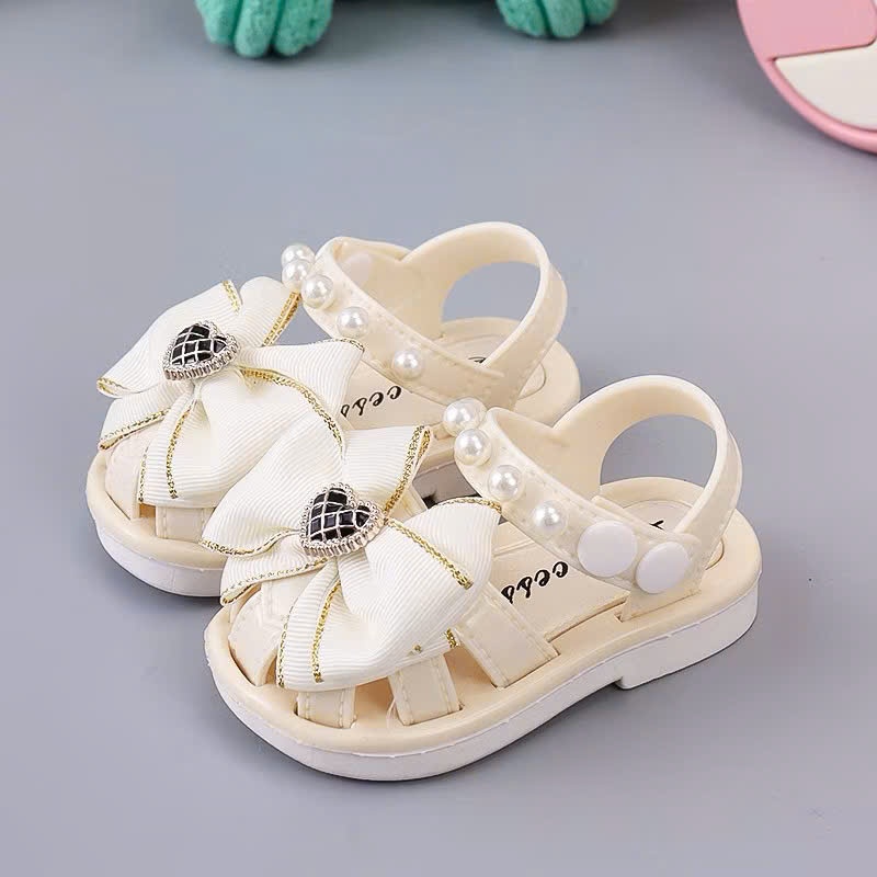 Giày nút bấm cho bé gái tập đi hình nơ công chúa siêu mềm êm chân bé