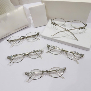 kính jen nie dáng mắt oval gọng đính đá sang chảnh qccc