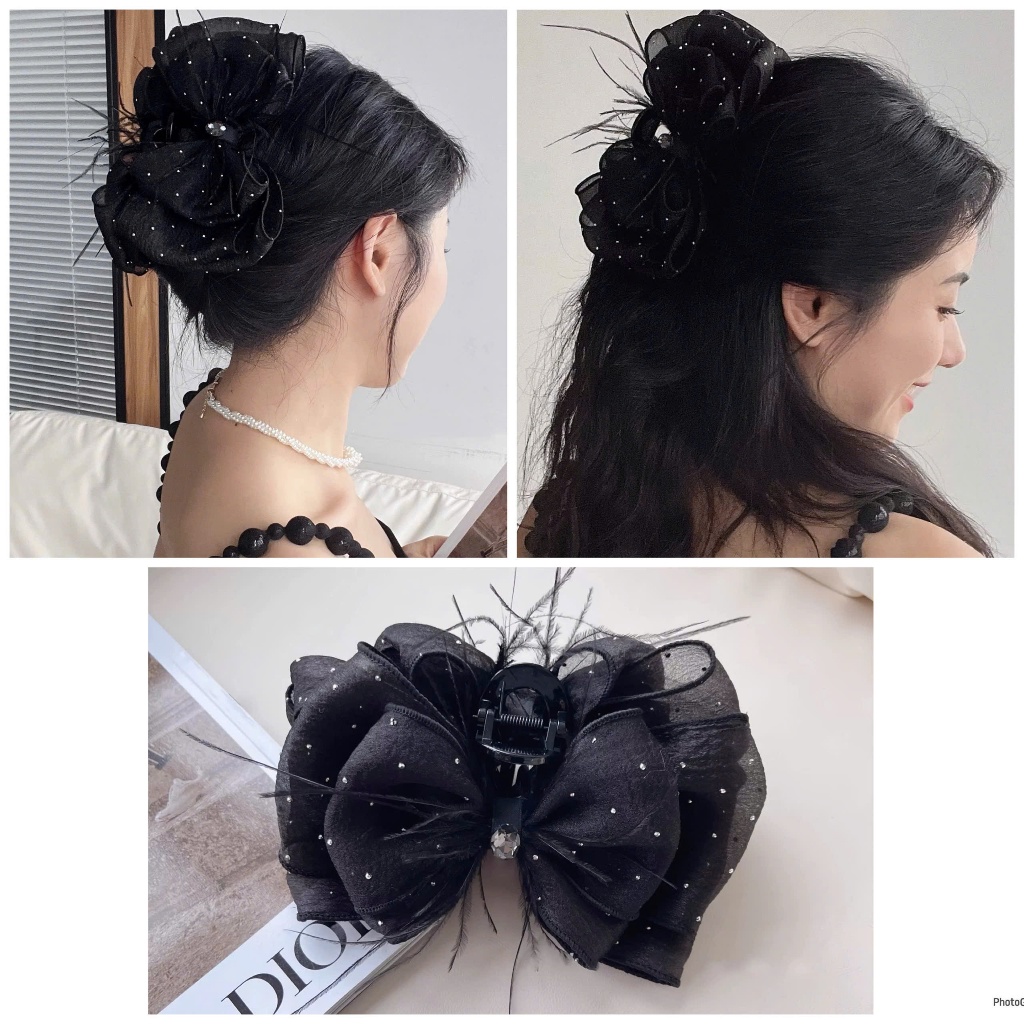 Nơ đen lông vũ