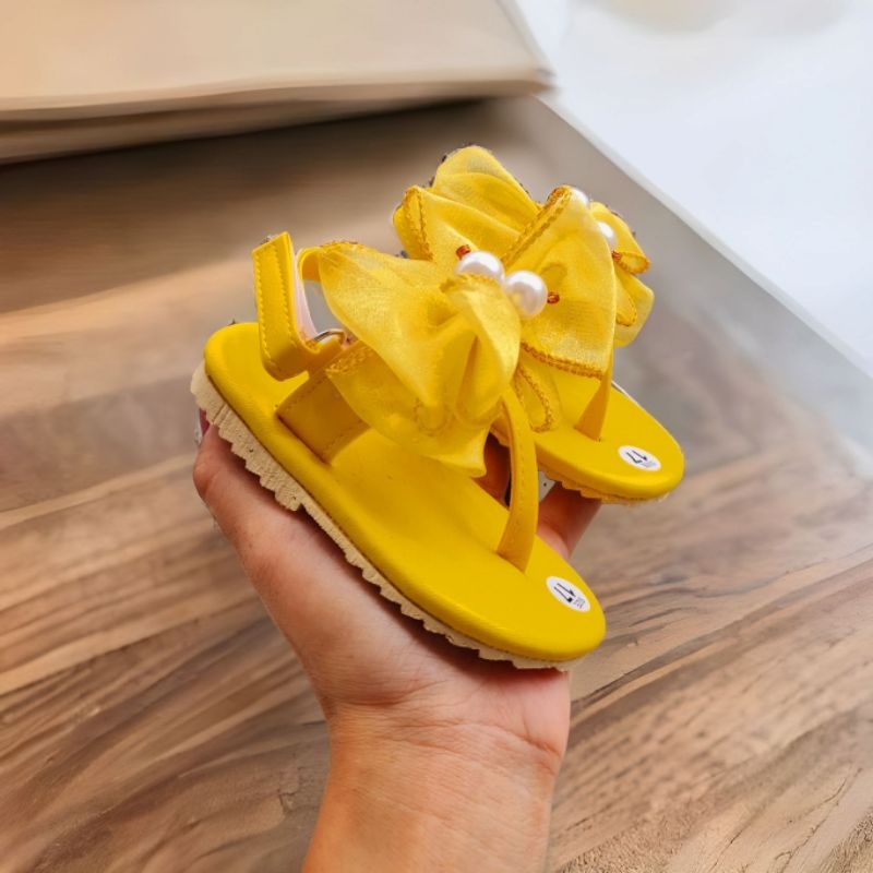 Giày xỏ ngón có quai dán cho bé gái dễ thương nơ chất liệu da PU