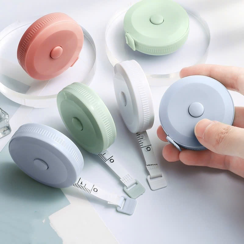 Ảnh Thước Dây Cuộn Mini Thu Rút Tự Động Hộp Tròn 1.5 Mét Đo Eo Vòng Bụng Chiều Cao Tiện Lợi Đo Quần Áo 1