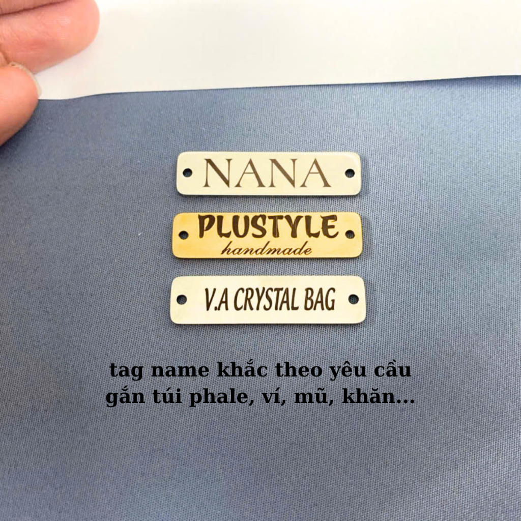 Tag name gắn túi xách, tag gắn ví mũ….Khắc theo yêu cầu, khắc tên, logo, con giáp, icon..