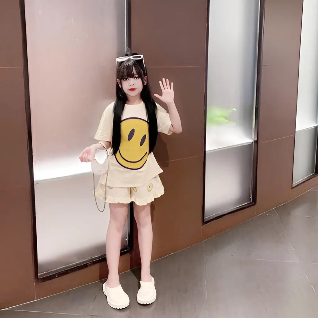 4-14 TUỔI Bộ quần áo bé gái áo cộc tay in hình mặt cười dễ thương chất vải cotton mềm mịn.M19