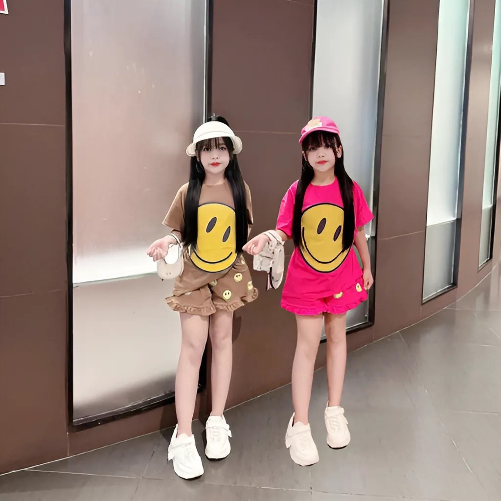 4-14 TUỔI Bộ quần áo bé gái áo cộc tay in hình mặt cười dễ thương chất vải cotton mềm mịn.M19