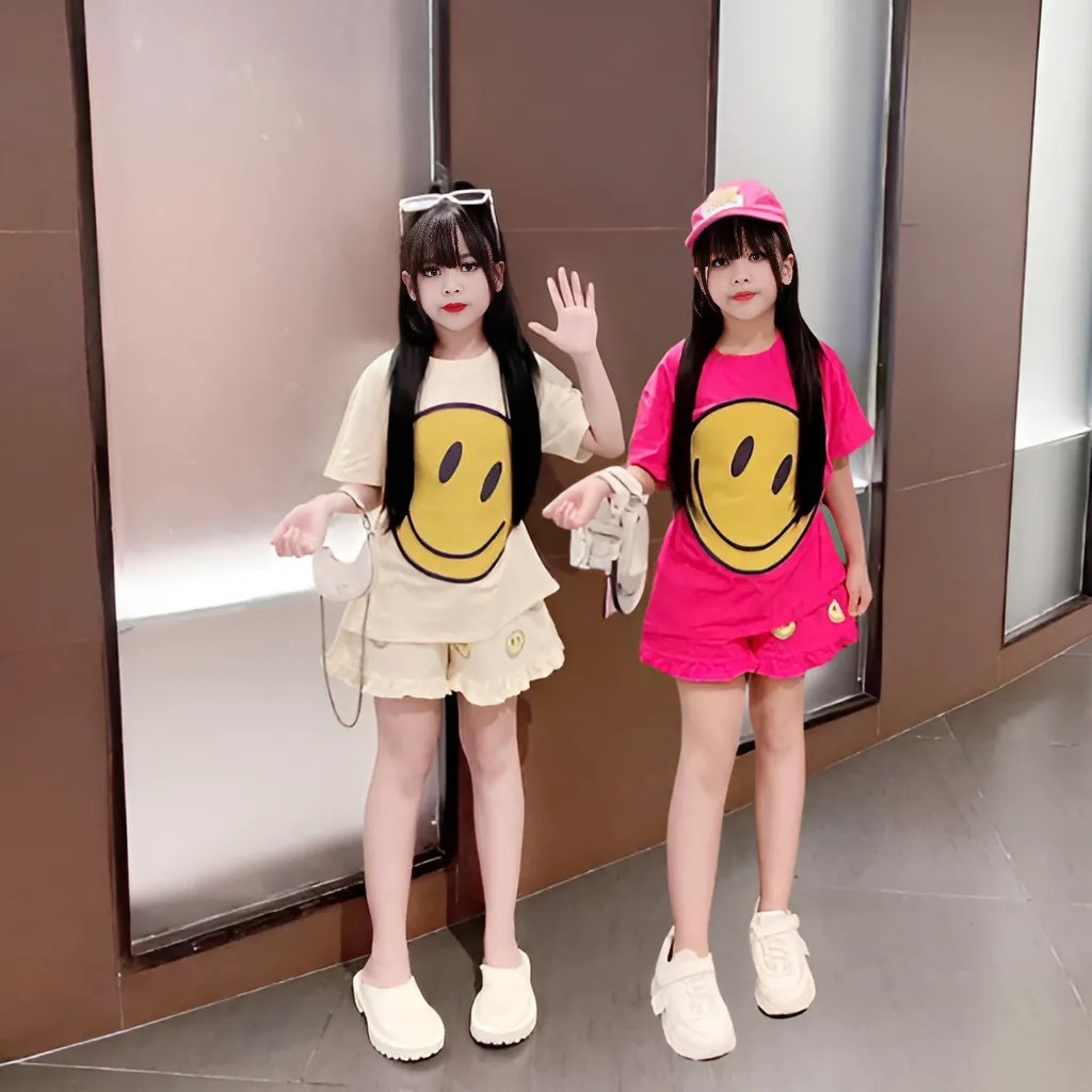 4-14 TUỔI Bộ quần áo bé gái áo cộc tay in hình mặt cười dễ thương chất vải cotton mềm mịn.M19