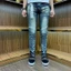 Quần Jeans nam xanh pơ pồ vàng kẻ ngang bốn cúc tang lụa