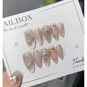 Nail box Mẫu nail mắt mèo charm nơ vương miện