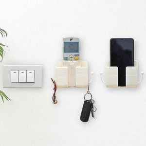 KHAY DÁN TƯỜNG ĐỰNG ĐIỆN THOẠI DÂY SẠC ĐA NĂNG TIỆN LỢI