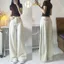 Quần jeans trắng kem Hari ánh rêu ống rộng