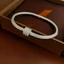 Vòng tay zircon mạ vàng hồng 18k sang trọng nhẹ nhàng đa năng thép titan cao cấp VT1
