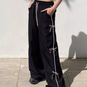 Quần dài ống rộng cạp chun đính nơ 1 sọc đen phối hồng Quần nữ ống suông chất da cá mặc nhà đi chơi thể thao cafe T765G