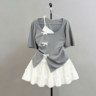 Set bộ Bigsize Nữ áo thun kiểu tay ngắn cách điệu 2 lớp viền gắn nơ phối chân váy chữ A bèo có quần bảo hộ - SET978